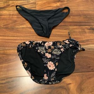 2 black billabong swimsuit bottoms for surfing